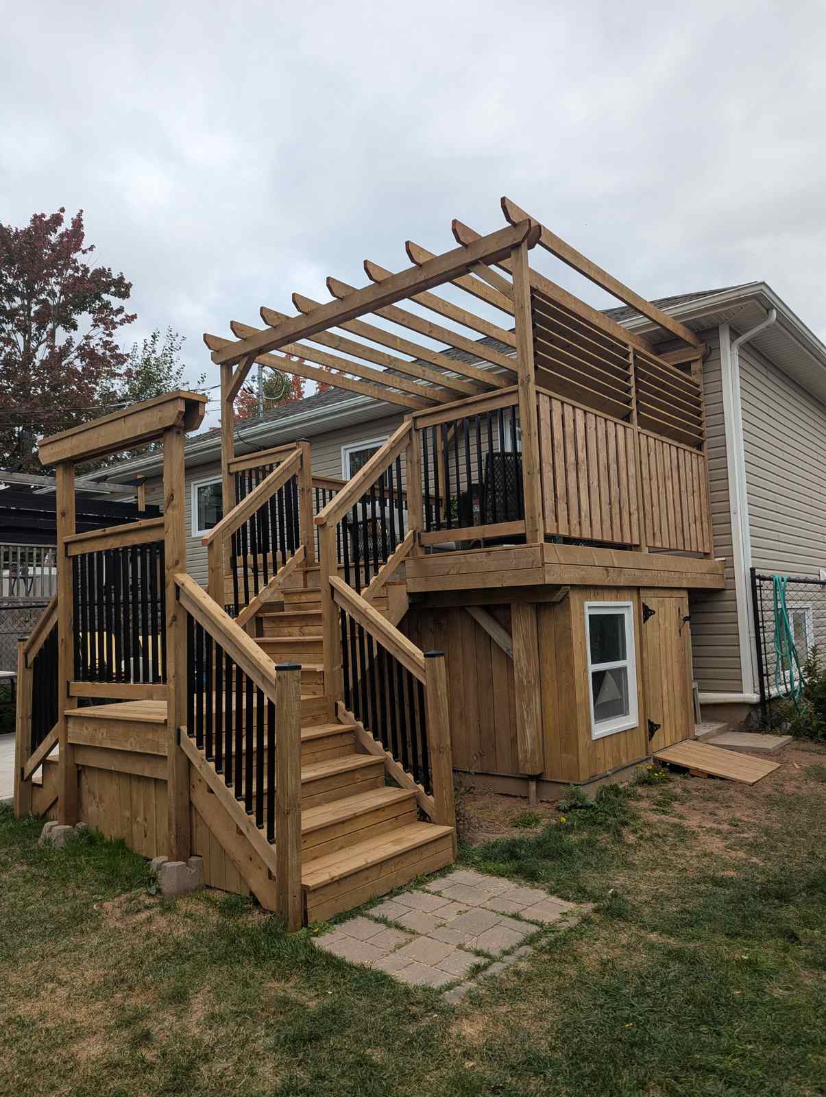 Custom deck and outdoor living space built by Valhalla Construction in Moncton, NB