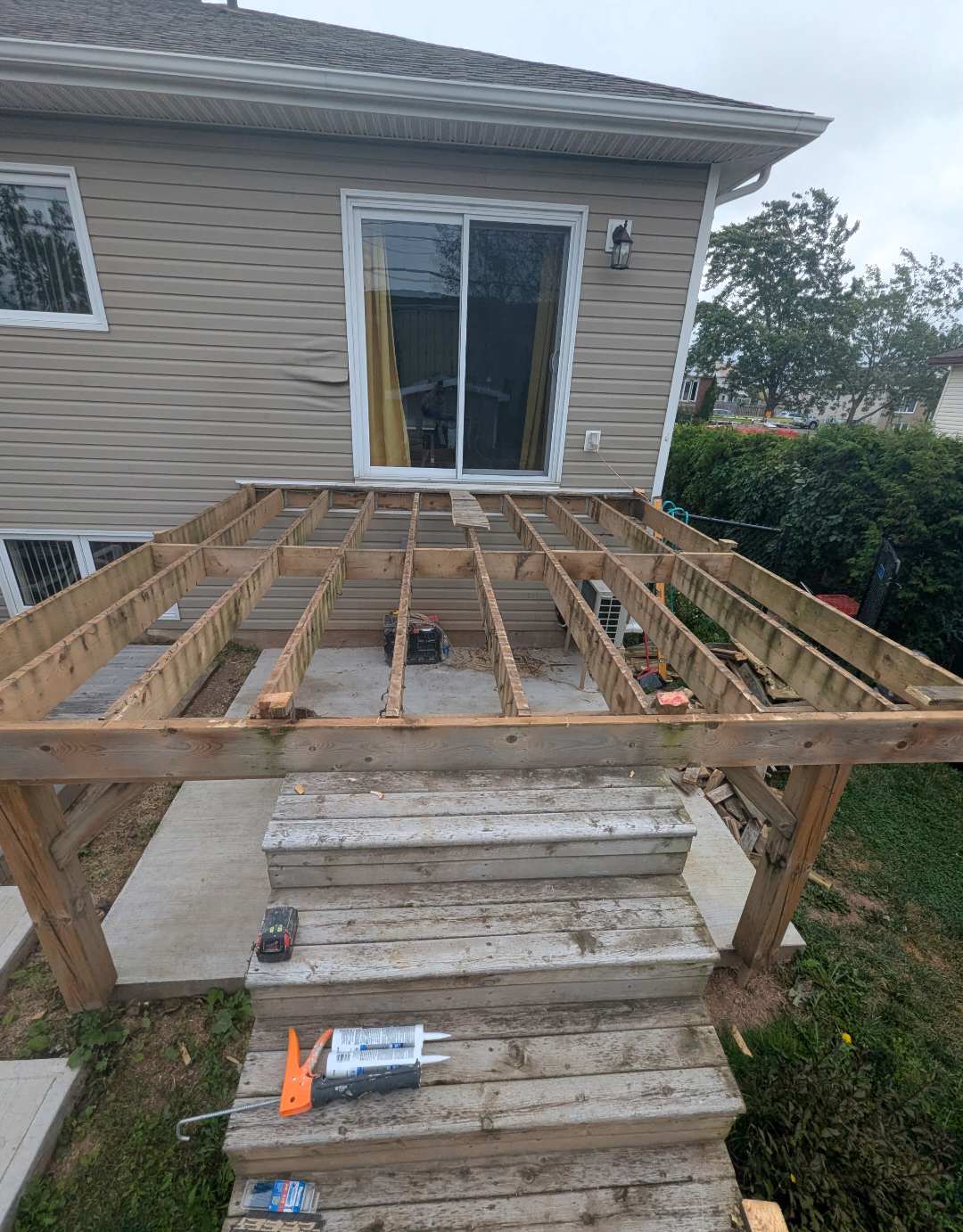 New deck joists and framing over concrete pad, Ayers Avenue