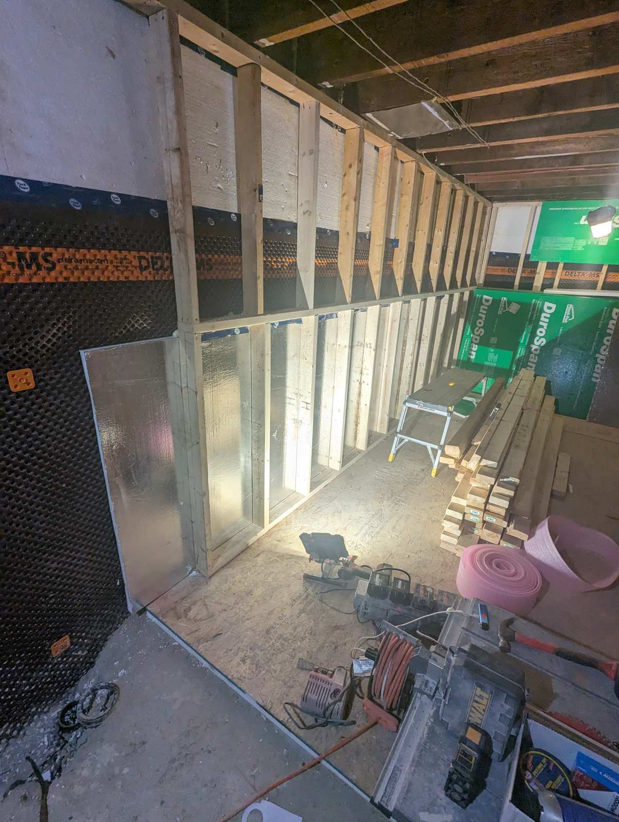 Delta-MS dimple membrane and DuroSpan rigid foam insulation on basement foundation wall by Valhalla Construction, Riverview NB