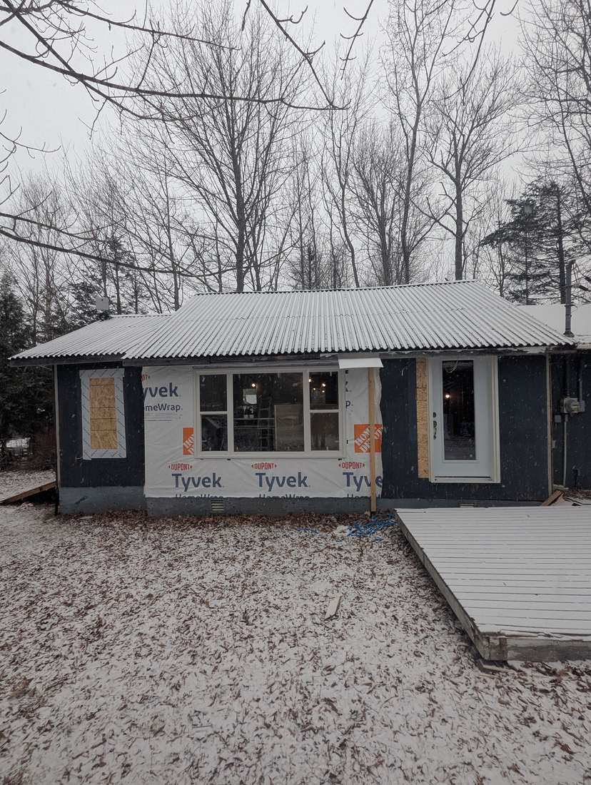 Front elevation wrapped in Tyvek house wrap before insulation